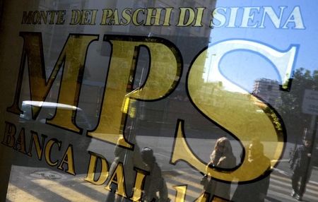 © Reuters. People are reflected in the window of a Monte Dei Paschi Di Siena bank in Rome