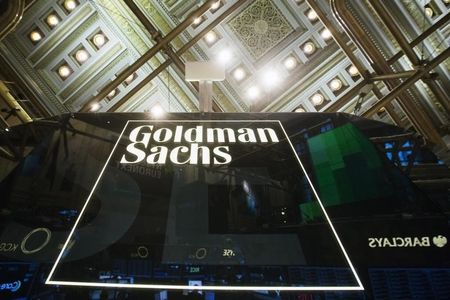 © Reuters. Goldman Sachs sign is seen above floor of the New York Stock Exchange shortly after the opening bell in the Manhattan borough of New York