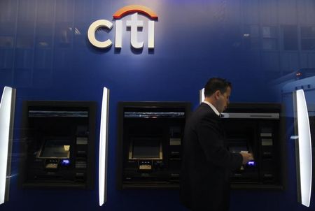 © Reuters. A man walks past a Citibank branch in lower Manhattan, New York