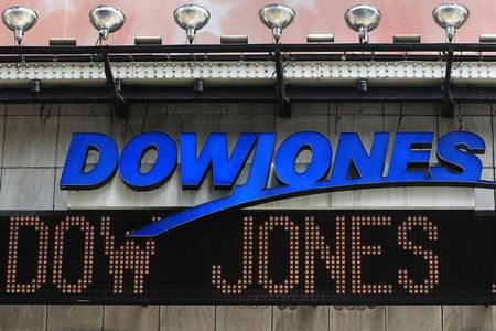 © Reuters. The Dow Jones financial electronic ticker is seen at Times Square in New York