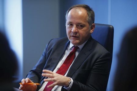 © Reuters. Coeure, executive board member of the ECB, speaks during an interview with Reuters in Frankfurt