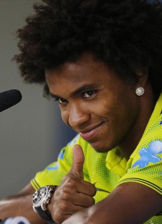 © Reuters. Jogador da seleção brasileira Willian em coletiva de imprensa em Teresópolis