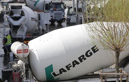 © Reuters. Concrete mixing trucks are seen at Lafarge concrete production plant in Pantin