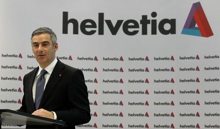 © Reuters. Loacker, CEO of Swiss insurer Helvetia addresses a news conference to present the results for 2010 in Zurich