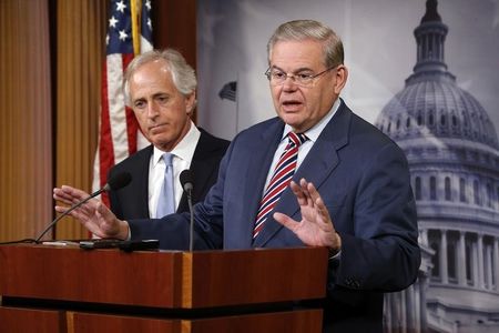 © Reuters. Menendez and Corker hold a news conference after a Senate vote on an aid package for Ukraine at the U.S. Capitol in Washington