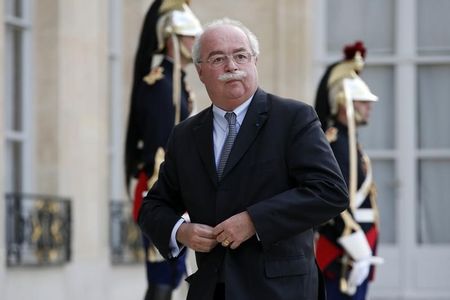 © Reuters. Christophe de Margerie, CEO of the French oil and gas company Total SA arrives to attend a dinner at the Elysee Palace in Paris