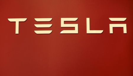 © Reuters. A Tesla Motors logo is shown at a Tesla Motors dealership at Corte Madera Village, an outdoor retail mall, in Corte Madera