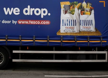 © Reuters. Part of a slogan is pictured on the side of a Tesco supermarket delivery truck in New Malden southwest London