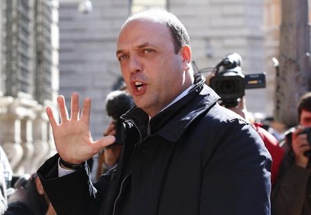 © Reuters. Italy's Interior Minister Alfano arrives for a confidence vote at the Senate in Rome