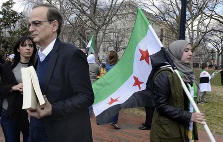 © Reuters. Anti-Assad regime demonstrators mark third anniversary of Syrian revolution at Washington rally