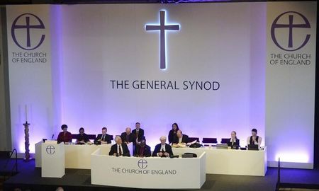 © Reuters. Members of the Church of England's Synod attend the session during which they will discuss and vote on the consecration of women bishops, in York