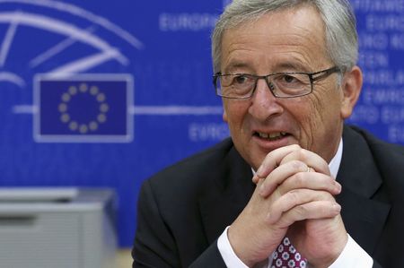 © Reuters. Designated president of the EU Commission Juncker attends a meeting with the ECR Group in the EU Parliament in Brussels