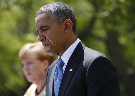 © Reuters. Obama promete cooperación de inteligencia a Merkel