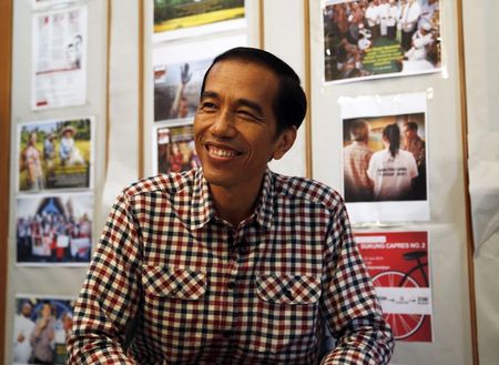 © Reuters. Indonesia presidential candidate Joko "Jokowi" Widodo smiles during an interview with Reuters in Jakarta