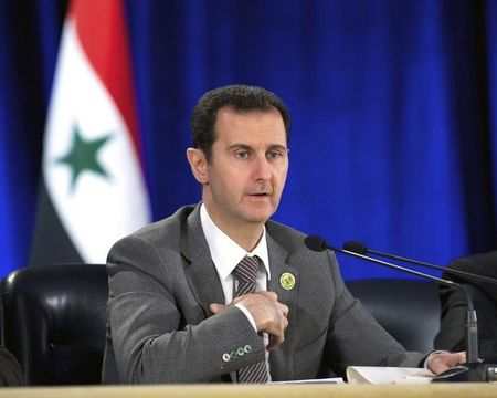 © Reuters. الأسد يؤدي اليمين ويتعهد باستعادة كافة الأراضي السورية من ايدي المعارضين