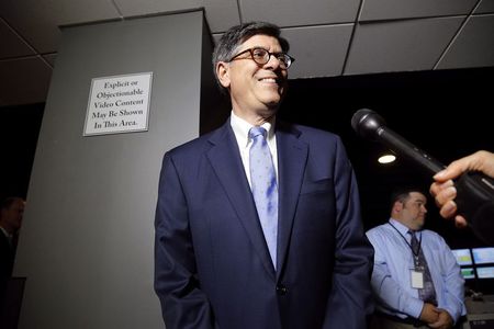 © Reuters. Lew stops for a question from a reporter during a cybersecurity-related tour of a Verizon network operations center at their facility in Ashburn, Virginia