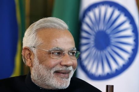 © Reuters. India's PM Modi reacts during a meeting with Brazil's President Rousseff on the sidelines of the 6th BRICS summit at the Alvorada Palace in Brasilia