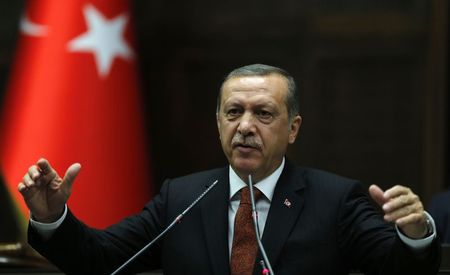 © Reuters. Turkey's Prime Minister Tayyip Erdogan addresses members of parliament from his ruling AK Party during a meeting at the Turkish parliament in Ankara