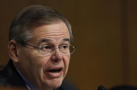 © Reuters. U.S. Senator Menendez listens during Senate Banking hearing in Washington