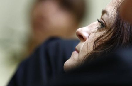 © Reuters. Defendant Zschaepe arrives for her trial in courtroom in Munich