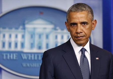 © Reuters. U.S. President Barack Obama pauses while he delivers remarks about Ukraine while in the press briefing room at the White House in Washington