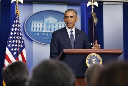 © Reuters. U.S. President Barack Obama talks about Ukraine while in the press briefing room at the White House in Washington