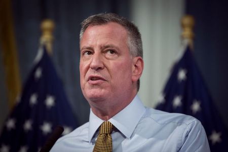 © Reuters. New York City mayor de Blasio speaks about the city's emergency preparedness for a summer storm bearing down on New York, at an official weigh in for the Nathan's Famous Fourth of July International Hot Dog Eating Contest at City Hall in New York