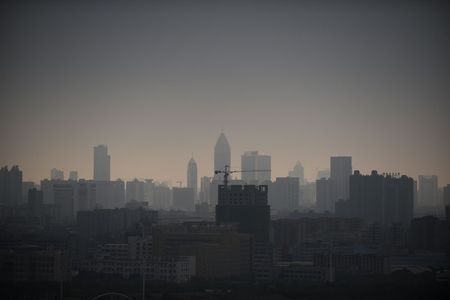 © Reuters. Construction sites are seen in Wuhan