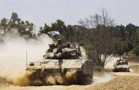 © Reuters. Soldados israelenses na Faixa de Gaza