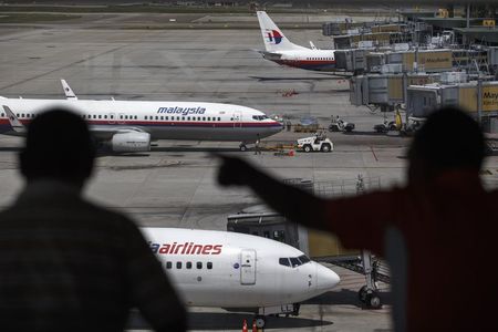 © Reuters. MALAYSIA AIRLINES POURRAIT-ELLE ÊTRE POURSUIVIE POUR NÉGLIGENCE ?