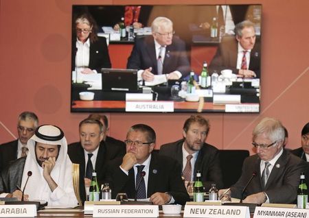 © Reuters. Saudi Arabia's Commerce and Industry Minister Al-Rabiah, Russia's Economic Development Minister Ulyukaev and New Zealand's Trade Minister Groser attend the G20 Trade Ministers meeting in Sydney