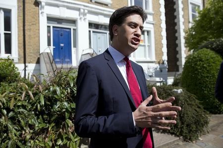 © Reuters. Britain's leader of the opposition Labour Party Ed Miliband speaks to the media outside his home in London