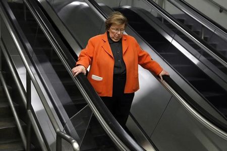 © Reuters. Mikulski rides an escalator into the subway system at the U.S. Capitol in Washington
