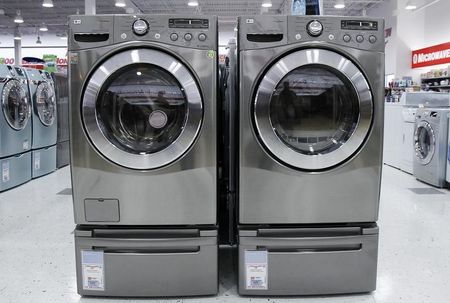 © Reuters. Washers and dryers are seen on display at a store in New York