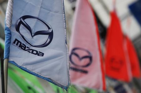 © Reuters. Logos of Mazda Motor Corp are seen at a dealership in Tokyo