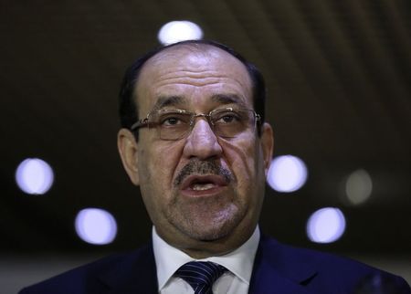 © Reuters. مسلحون يرتدون زي الجيش يخطفون مسؤولا سنيا في بغداد ويطلقون سراحه لاحقا