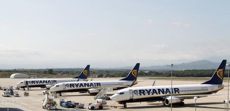 © Reuters. Ryanair planes are seen parked at Girona airport