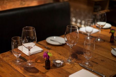 © Reuters. A table setting is seen at restaurant Marc Forgione in New York