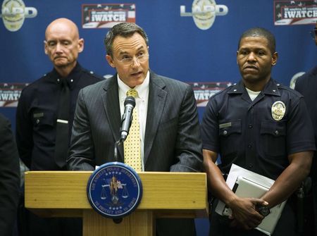 © Reuters. Dickey, senior vice president for administration at USC, speaks during a news conference in Los Angeles