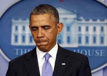 © Reuters. U.S. President Obama pauses while he talks about the Affordable Care Act at the White House in Washington