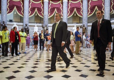 © Reuters. Speaker of the House John Boehner (R-OH) walks from his office to the House Chamber during a procedural vote at the Capitol