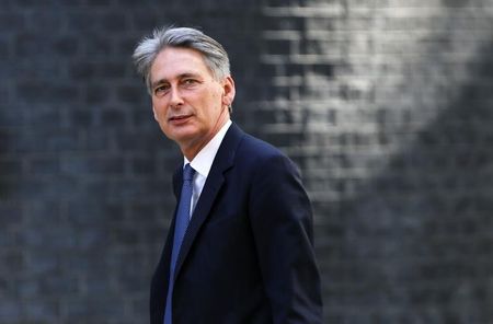 © Reuters. Britain's new Foreign Secretary Philip Hammond leaves 10 Downing Street in central London