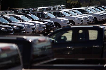 © Reuters. Vehicles sit parked in a lot at a General Motors vehicle factory in Sao Jose dos Campos