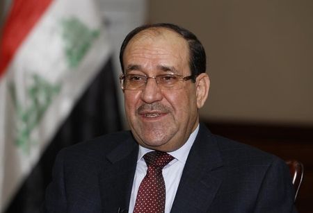 © Reuters. File photo shows Iraq's Prime Minister al-Maliki speaking during an interview with Reuters in Baghdad