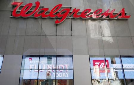 © Reuters. A Walgreens logo is seen outside its store in New York City