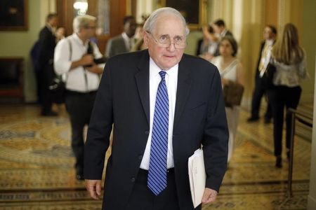 © Reuters. U.S. Senator Levin departs following the weekly Democratic caucus policy luncheon at the U.S. Capitol in Washington