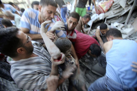 © Reuters. تغير وضع الفلسطينيين قد يؤدي لاتهام إسرائيل بارتكاب جرائم حرب