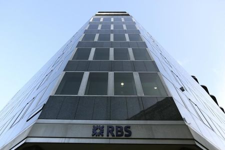 © Reuters. A sign is seen outside a Royal Bank of Scotland building in central London