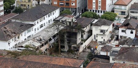 © Reuters. An aerial view of where a private jet carrying Campos crashed in Santos