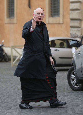 © Reuters. File photograph of Irish Cardinal Brady arriving at the Synod Hall in the Vatican